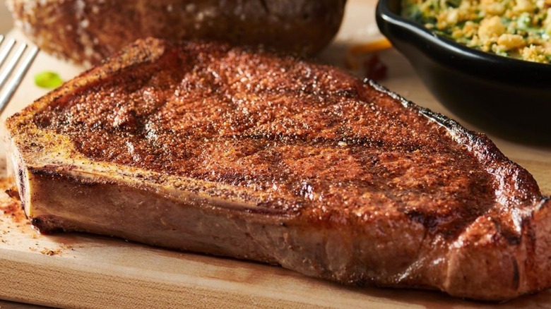 Bone-in New York Strip served at Outback Steakhouse