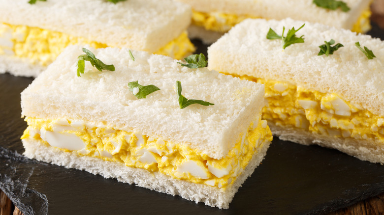 Platter of egg salad sandwiches