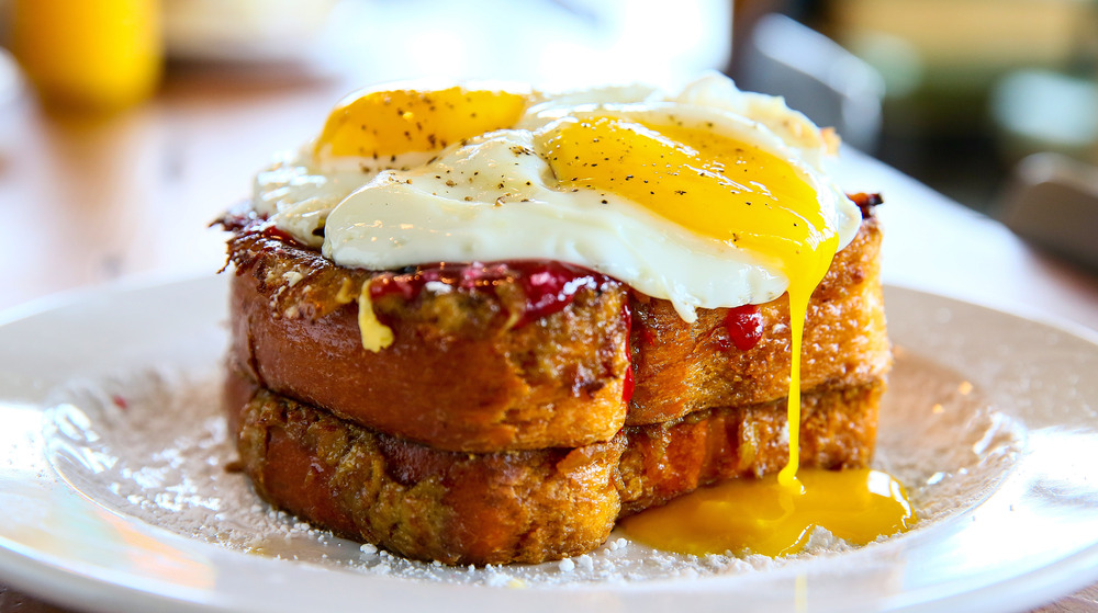 French toast stack with runny egg