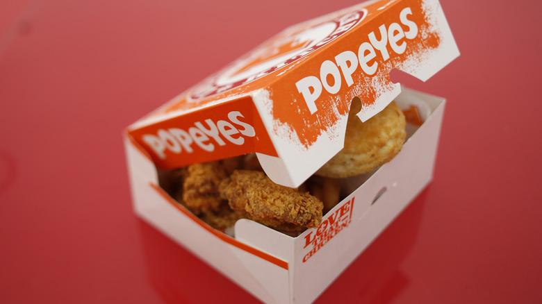 Popeyes chicken tender box with biscuit 