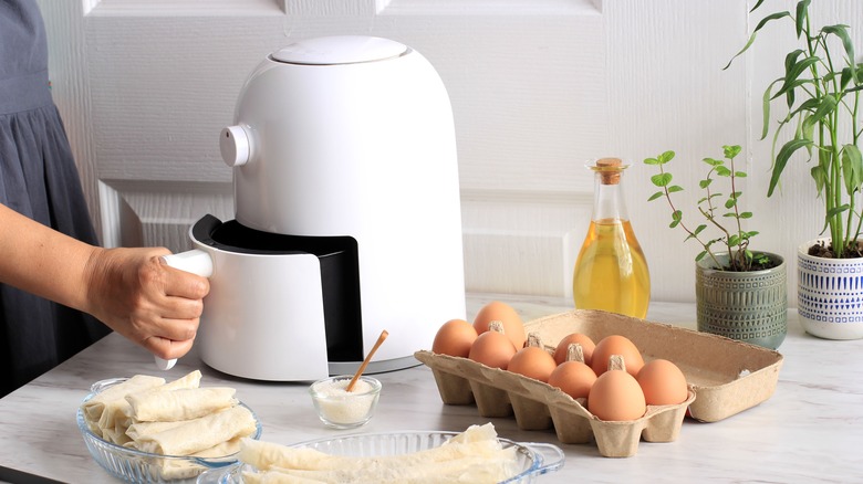 Air fryer with food prepped