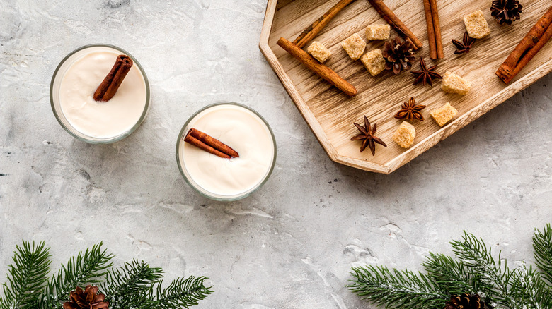 Two glasses of eggnog with spices