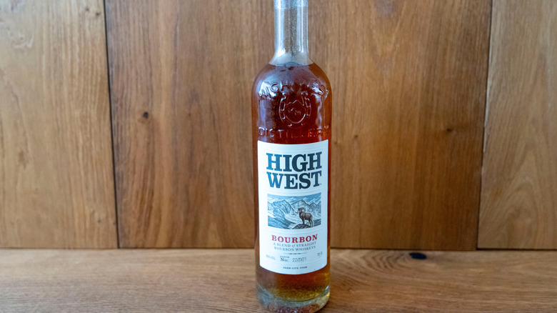 Bottle of High West bourbon on wooden background