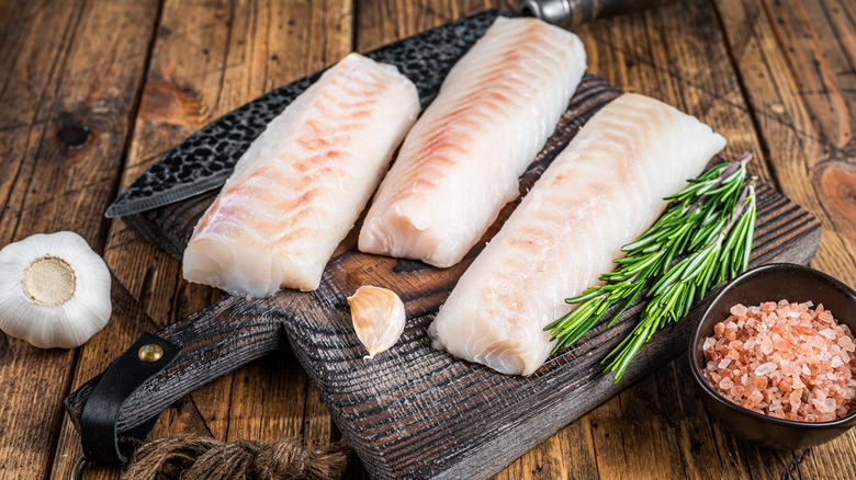 Cod fillets with rosemary, garlic, and salt