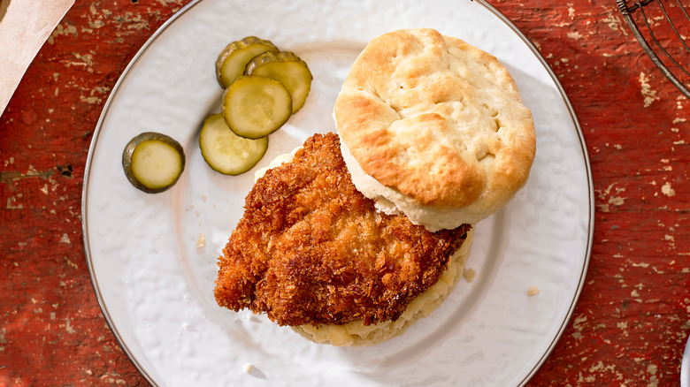 Chicken biscuit on a white plate