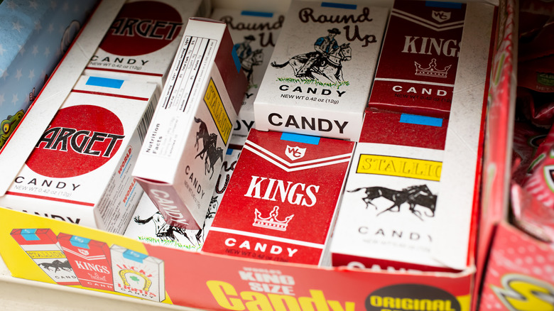 Boxes of candy cigarettes on a store shelf