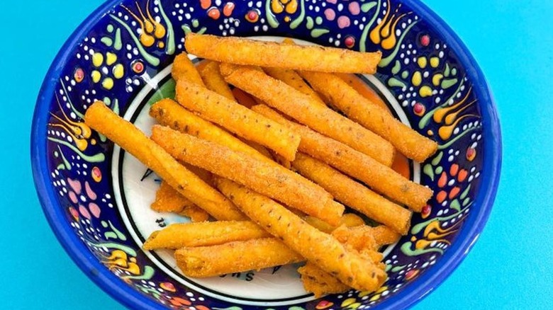 bowl of Doritos Rollitos chips