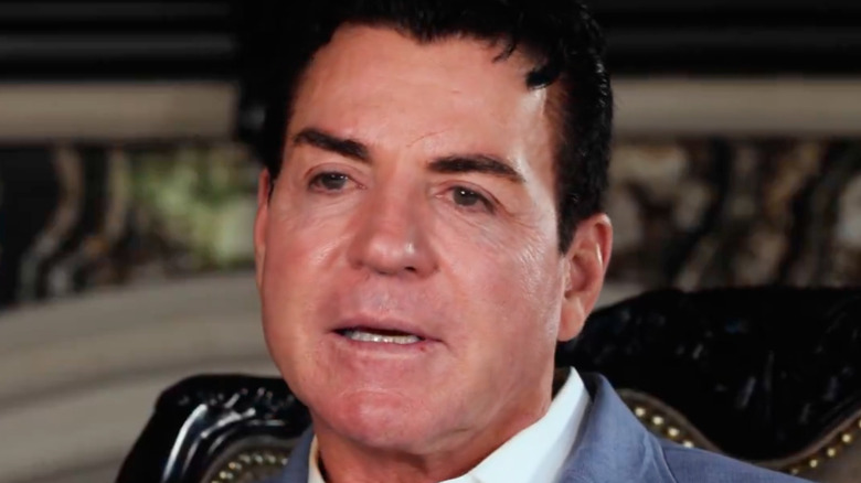 Close-up of John Schnatter seated