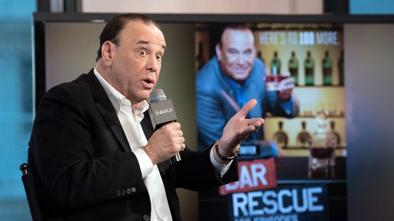 Jon Taffer speaking into microphone