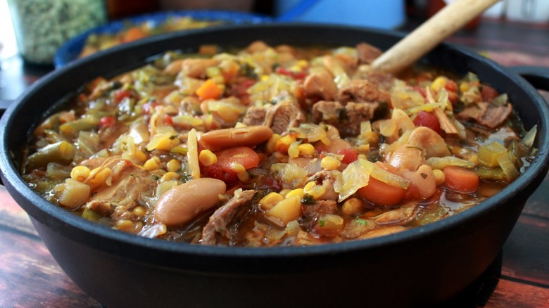 A Kentucky burgoo in black bowl
