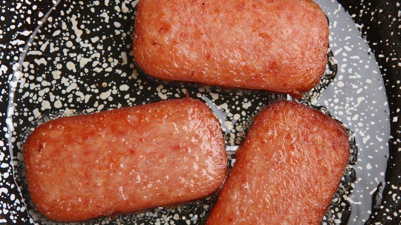 pan frying slices of spam