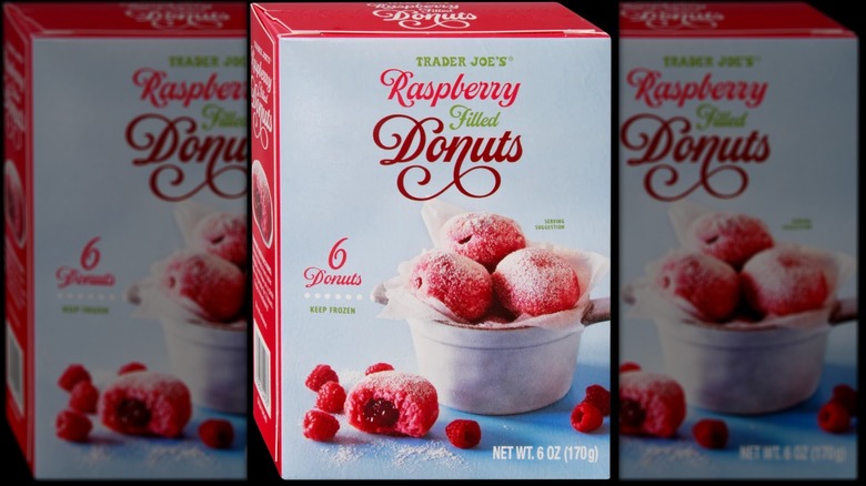 A red and blue box of Trader Joe's raspberry-filled donuts