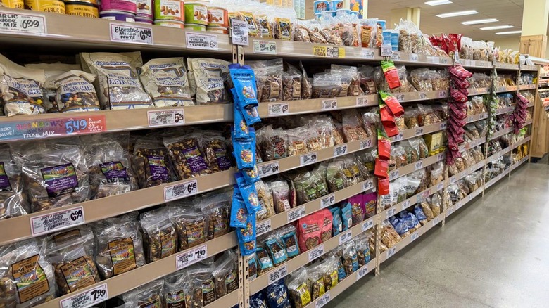 Snack aisle in Trader Joe's with assorted products.