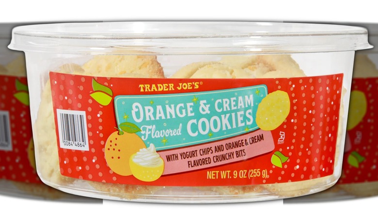 Tub of orange and cream flavored cookies.