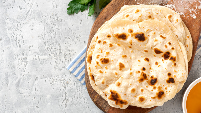 Naan on a wooden board