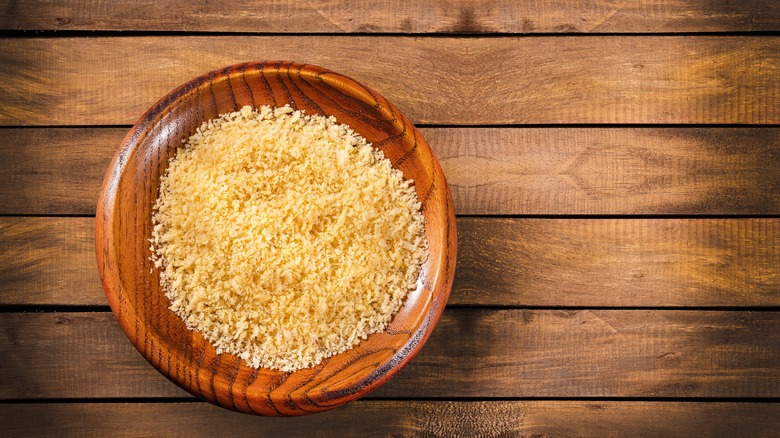 Panko in a bowl over a wooden background 