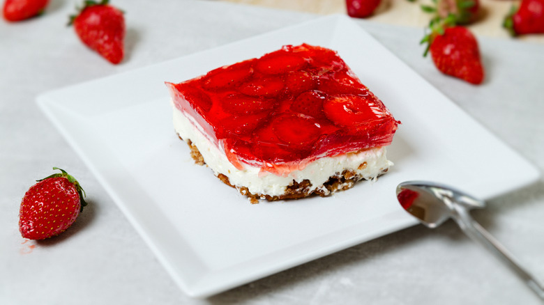 piece of strawberry pretzel salad on a plate