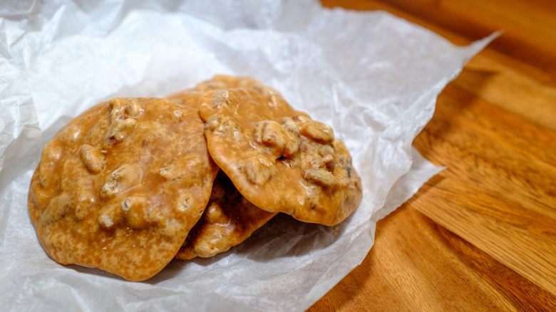 three pralines on top of wax paper