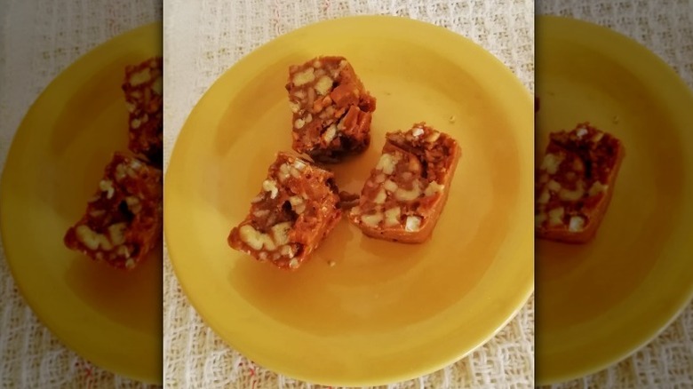 top view of Aunt Bill's brown candy on a yellow plate