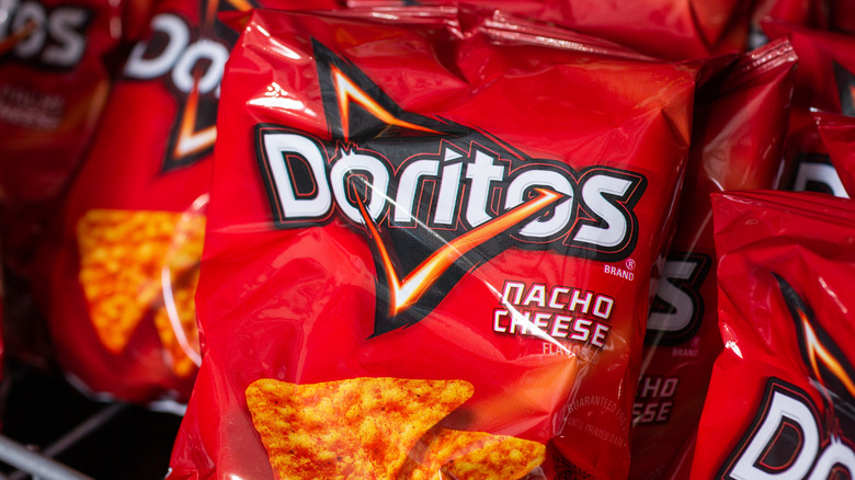 Several red bags of Doritos chips