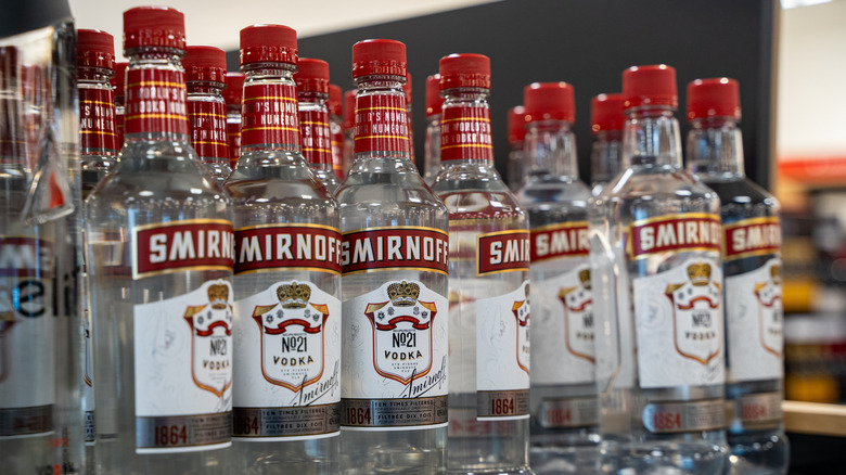 Bottles of Smirnoff No. 21 on store shelf.