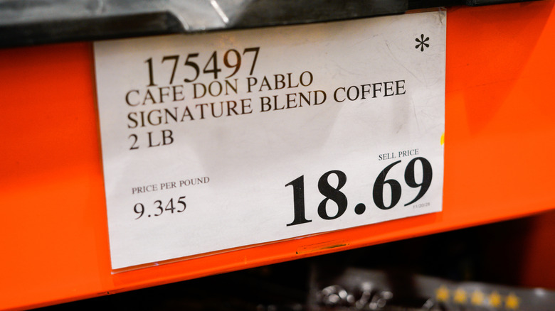 Price tag of coffee at Costco with asterisk in the upper right corner