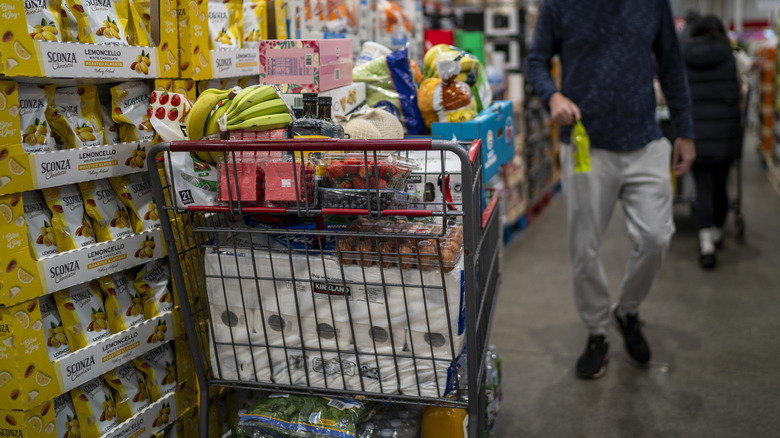 A fully stocked shopping cart at Costco