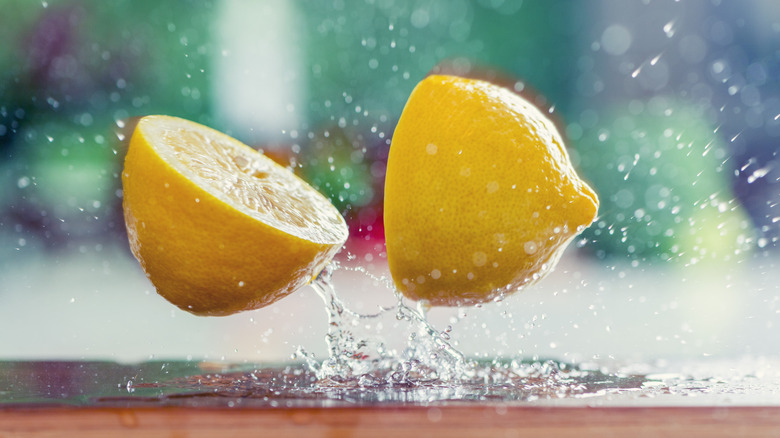 Sliced lemon in midair