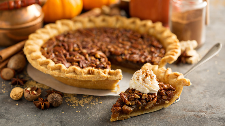 pecan pie with slice cut