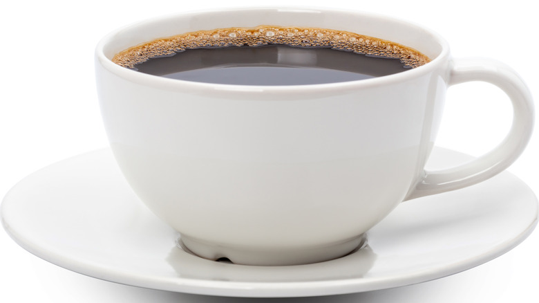 white mug with black coffee