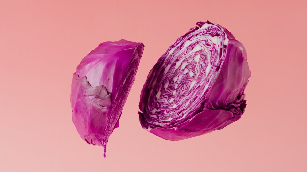 A red cabbage sliced in half