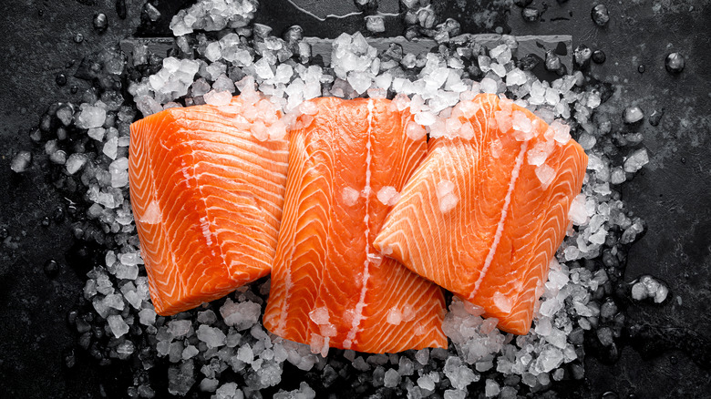 Fresh, raw salmon sitting on ice