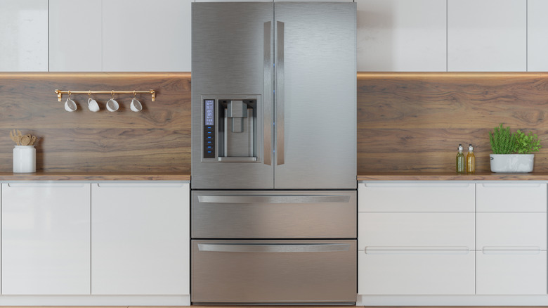 Steel refrigerator in kitchen
