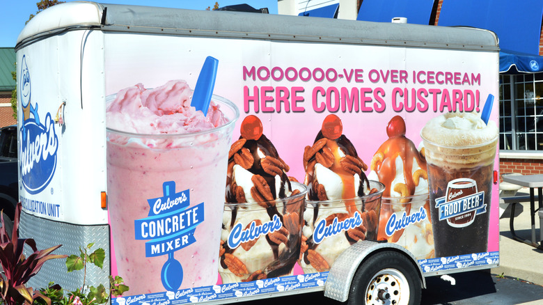 A mobile trailer covered with art of different Culver's custard options