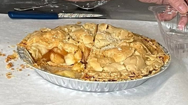 apple pie in tin on counter