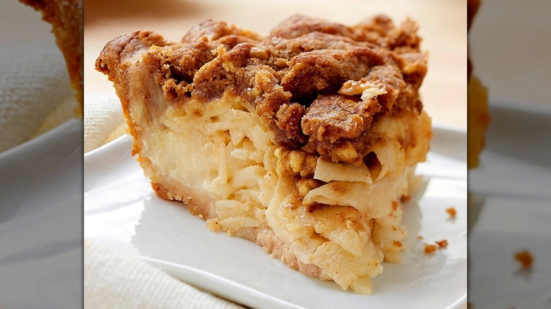 slice of walnut apple pie