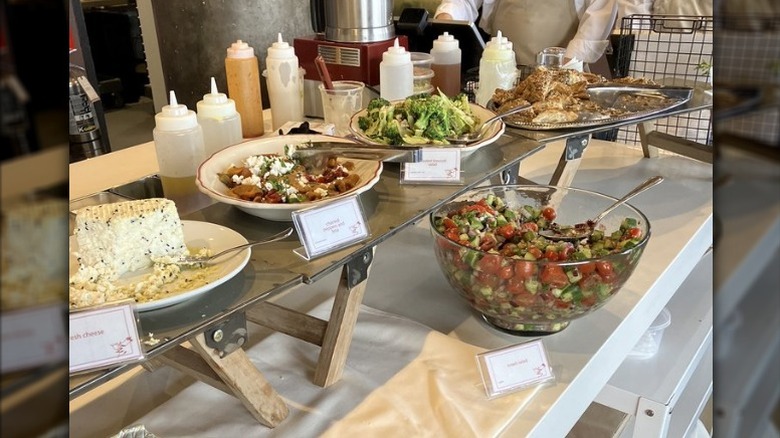 The brunch buffet showing various vegetable dishes at Safta in Denver.
