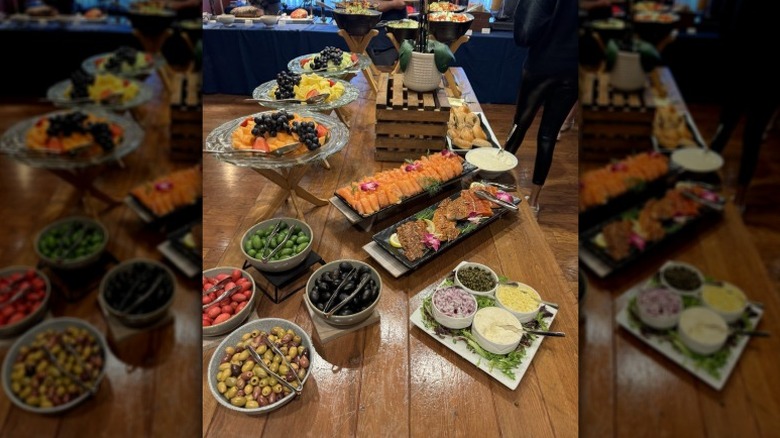 Sunday brunch table with various plates of food at Fresh Salt.