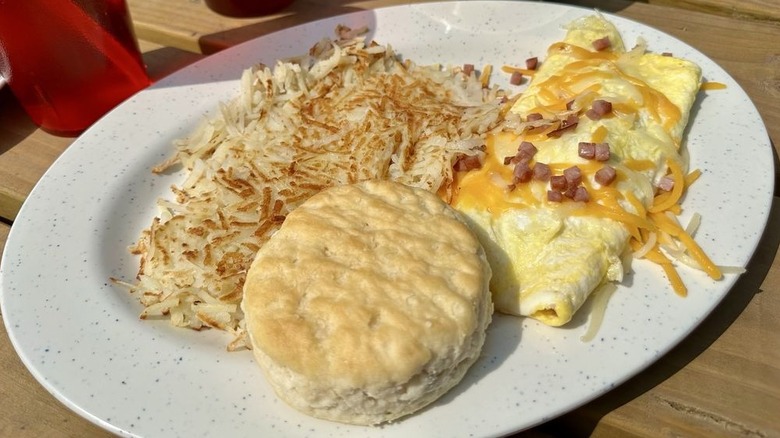 Biscuit, omelet, and hashbrowns.
