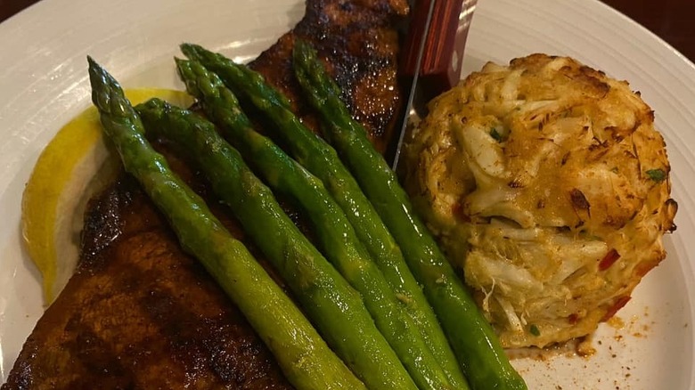 Crab cake combo with steak and asparagus
