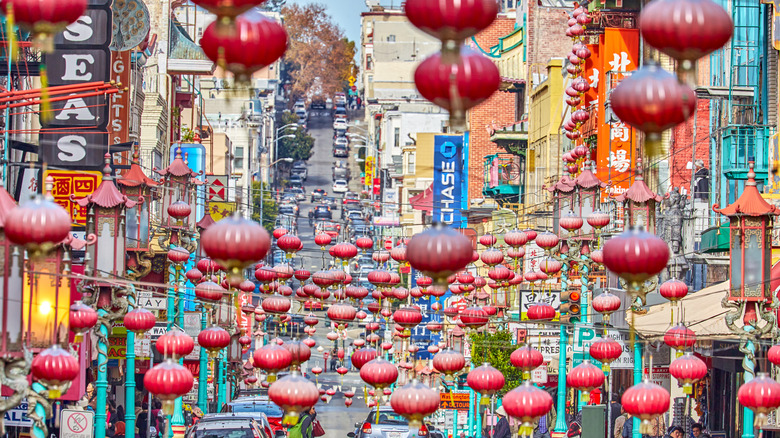 San Francisco Chinatown with many red paper lanters strung across street