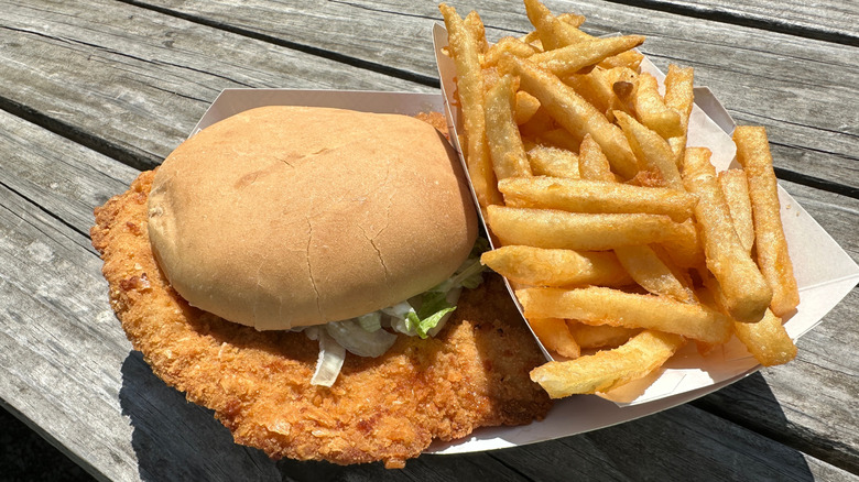 pork tenderloin sandwich served with fries