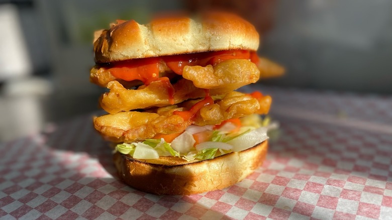 sandwich stacked with 3 pork tenderloins