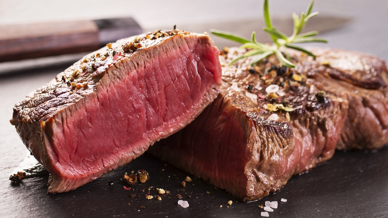 Cooked porterhouse steak on plate