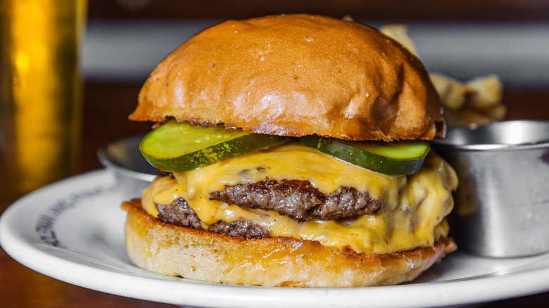 H and F cheeseburger on plate