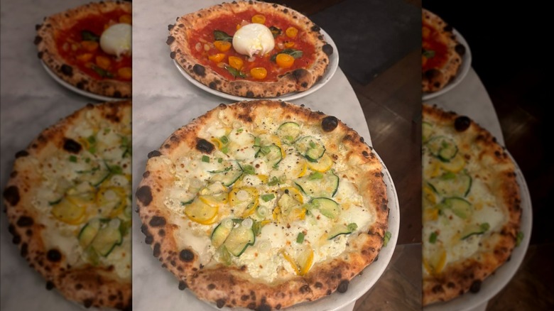 Two Pizza Brutta pizzas on a table