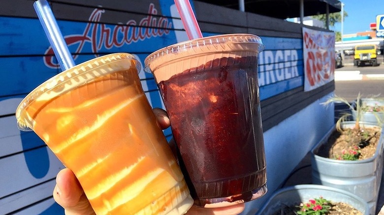 Milkshakes from The Stand, with restaurant Arcadia mural in background.