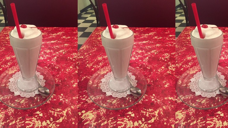 Milkshake in old-fashioned glass.