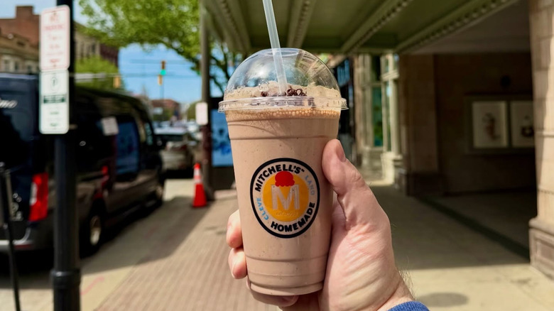 Chocolate milk shake in plastic cup from Mitchell's.