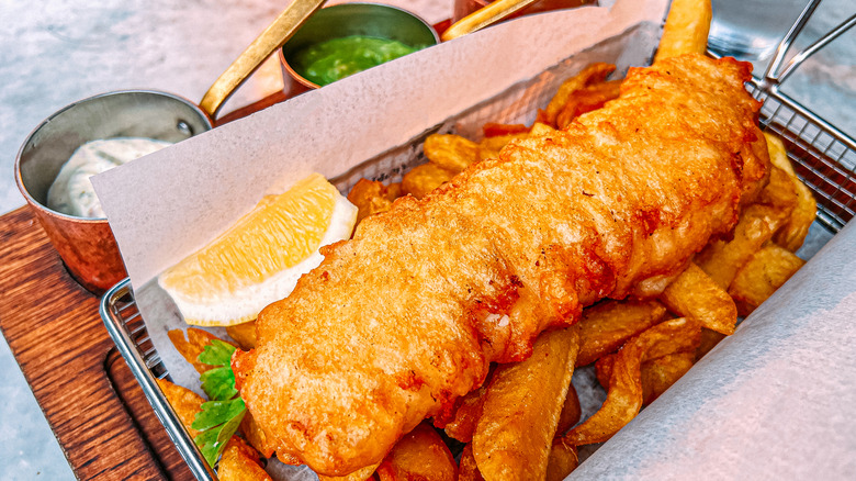 Fish and chips with mushy peas served in the United Kingdom